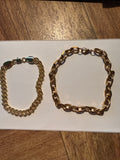 2 gold bracelets