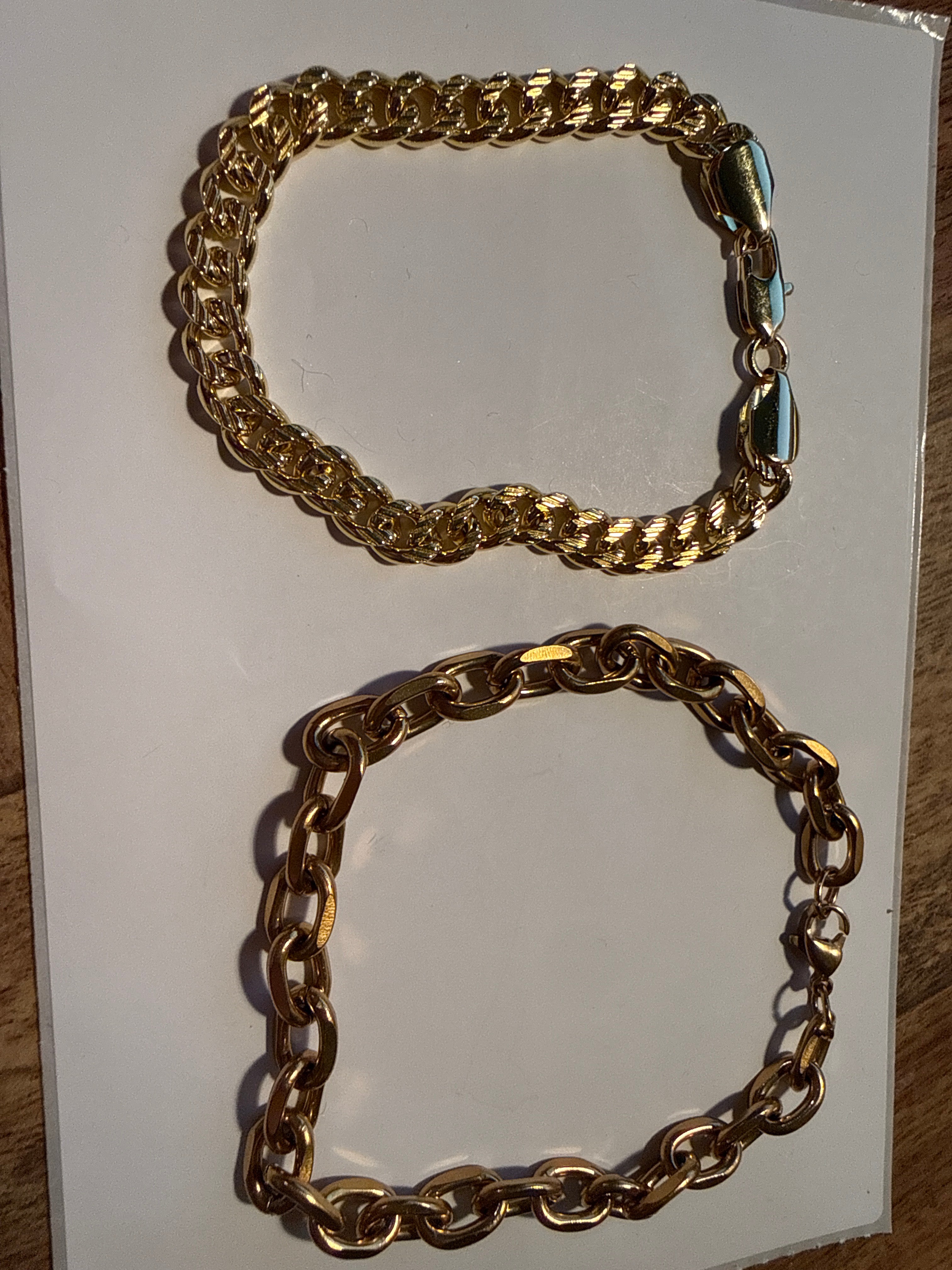 2 gold bracelets