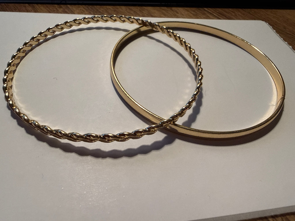 2 gold bracelets