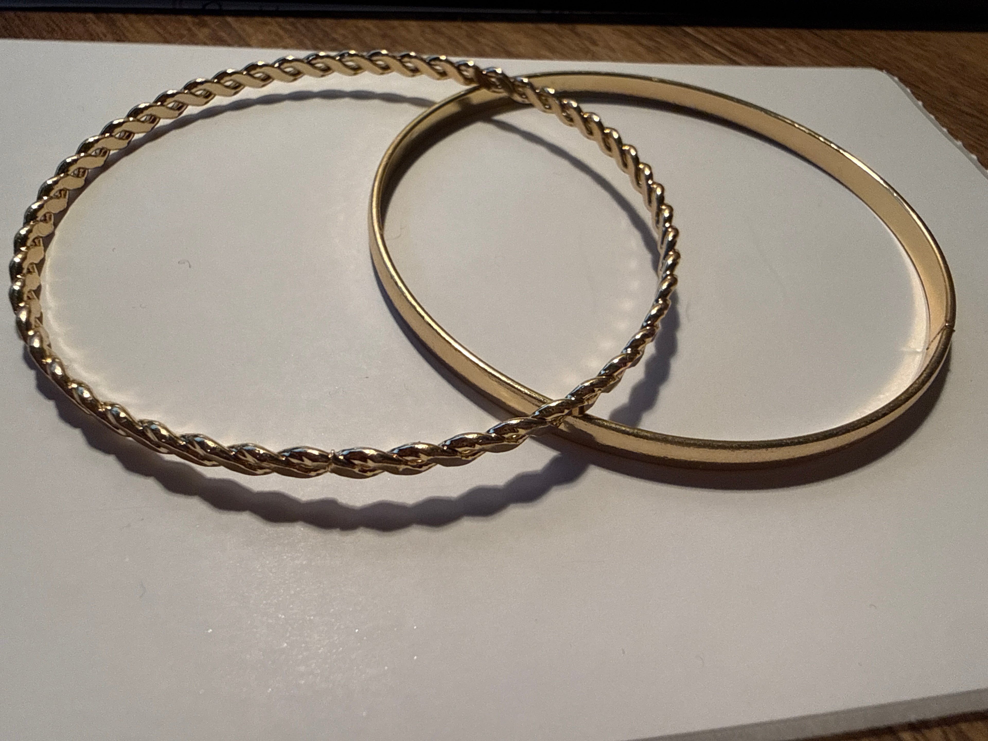 2 gold bracelets
