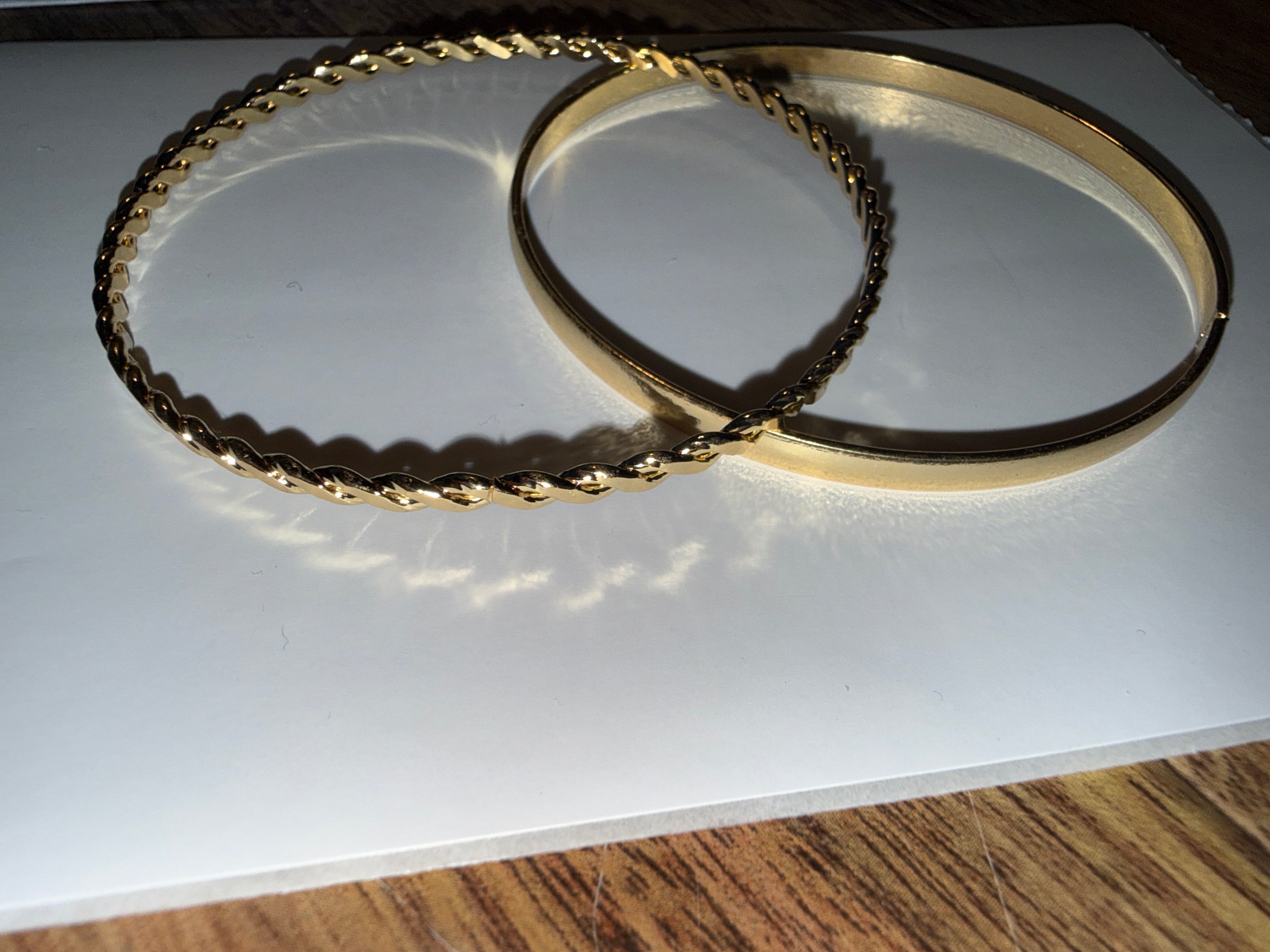 2 gold bracelets